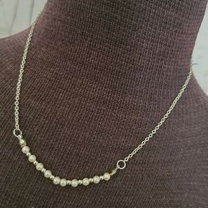 Delicate silvertone white faux pearl necklace 16 to 19 inches long